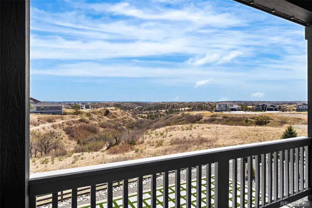 Open canyon and prairie views from a covered deck in The Canyons, Castle Rock