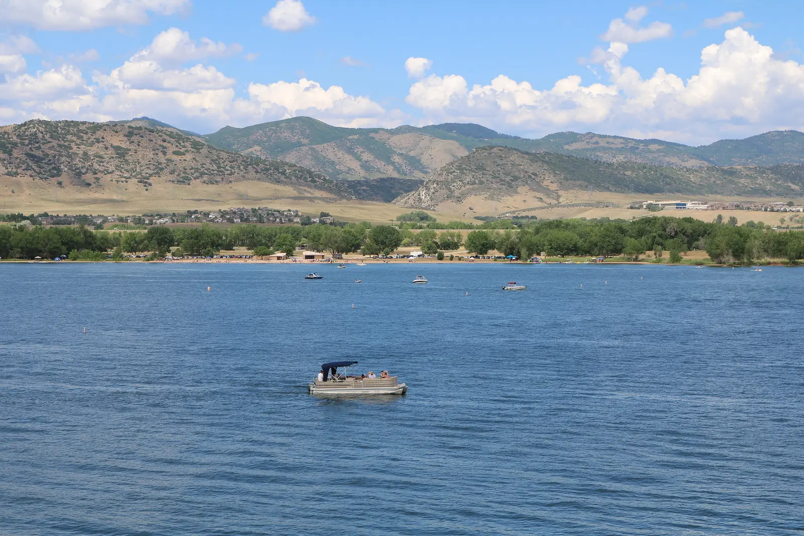 Chatfield Reservoir with boats on the water and the Front Range foothills behind, Chatfield State Park near Littleton