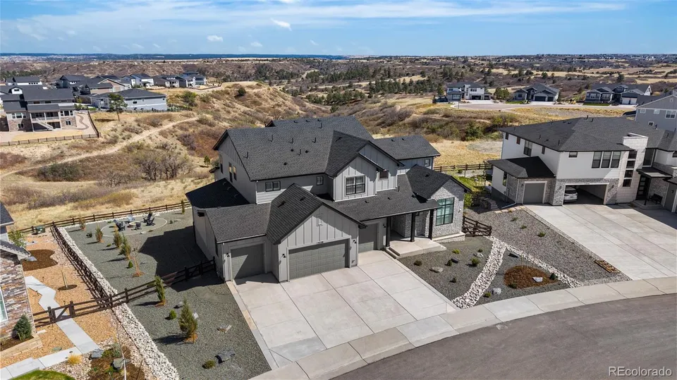 Aerial view showing the home site and open space