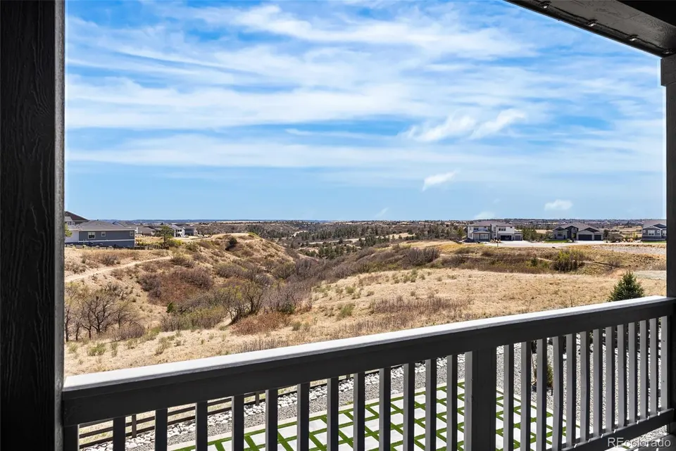 Open canyon and prairie views from the covered deck