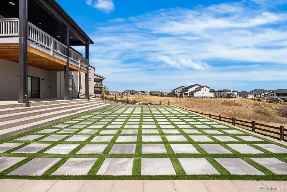 Backyard patio with paver and turf grid
