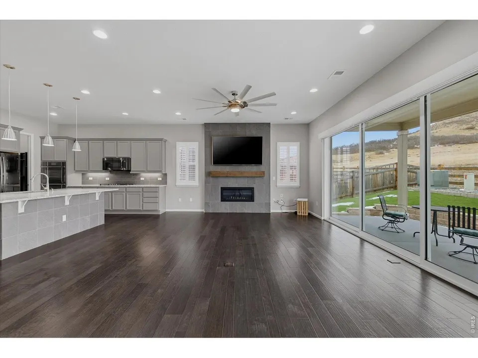 Living area looking toward the covered patio and open space