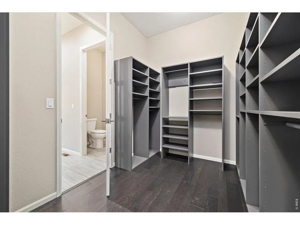 Custom walk-in closet in primary suite